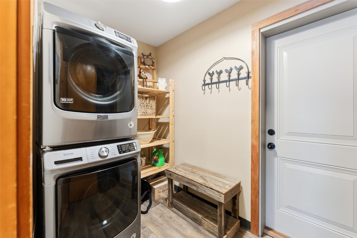 994 Summit Drive Dillon, CO 80435 - Photo 29 of 38 a view of a hallway with washer and dryer