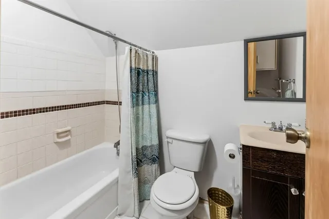 a view of a pathway with a yard