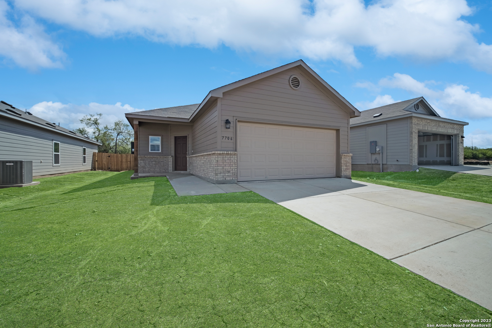 a house view with a garden space