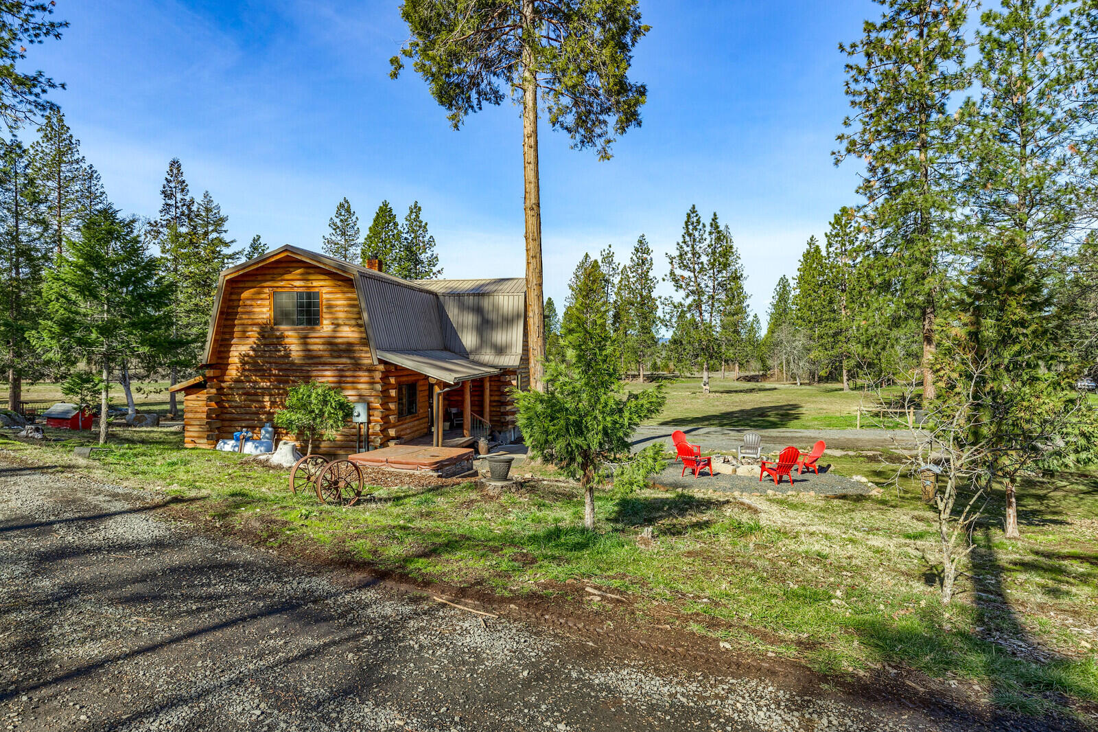 1501 North Obenchain Road Eagle Point, OR 97524 - Photo 9 of 68 a front view of a house with swimming pool