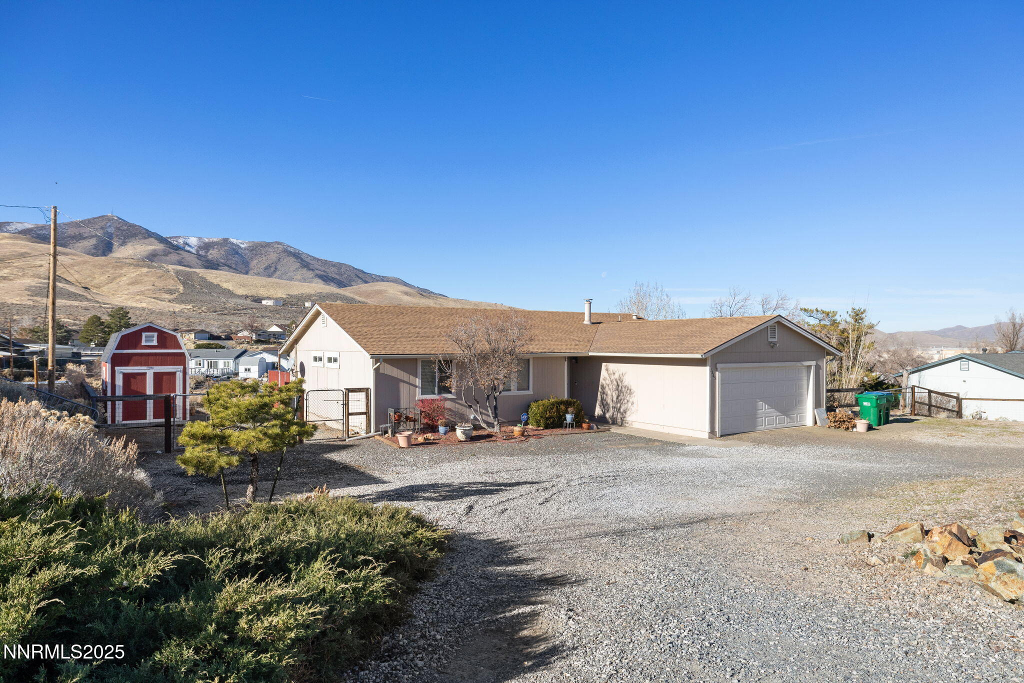 2265 Dakota Way Reno, NV 89506 - Photo 2 of 27 a front view of a house with a yard
