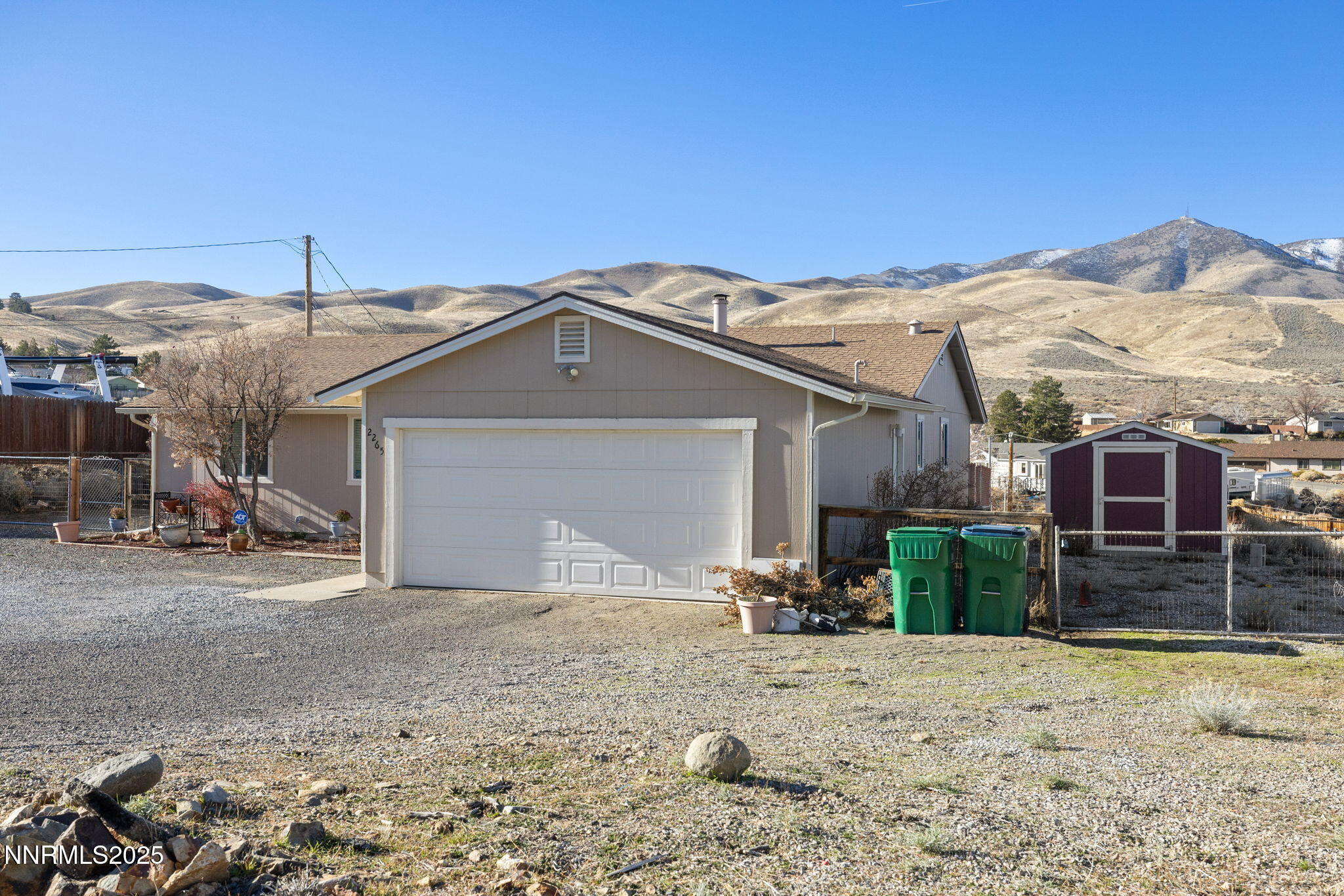 2265 Dakota Way Reno, NV 89506 - Photo 3 of 27 a view of a house with a snow in the yard