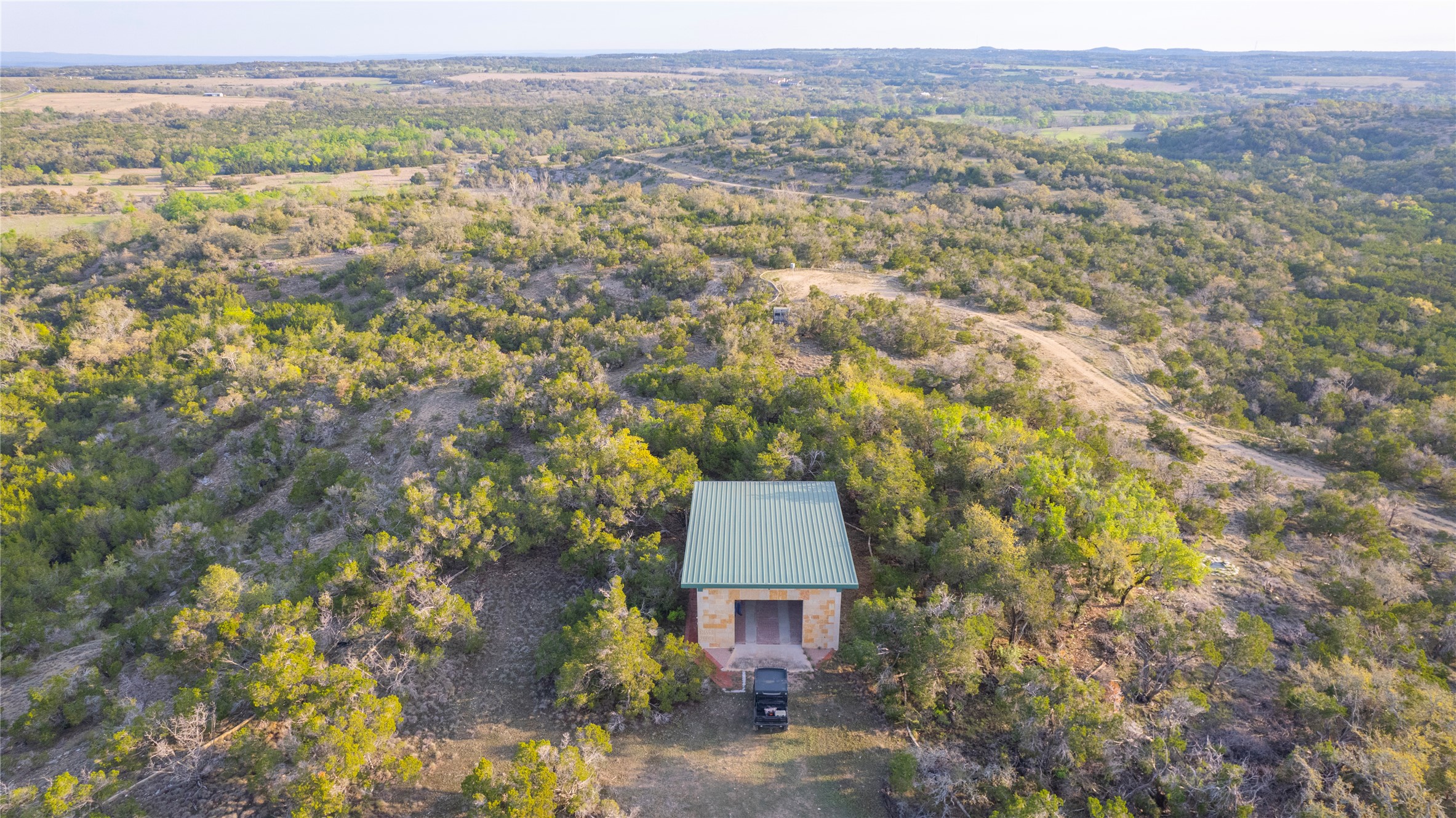 Tbd Bell Springs Road Dripping Springs, TX 78620 - Photo 18 of 40 Aerial view of a heavily wooded area