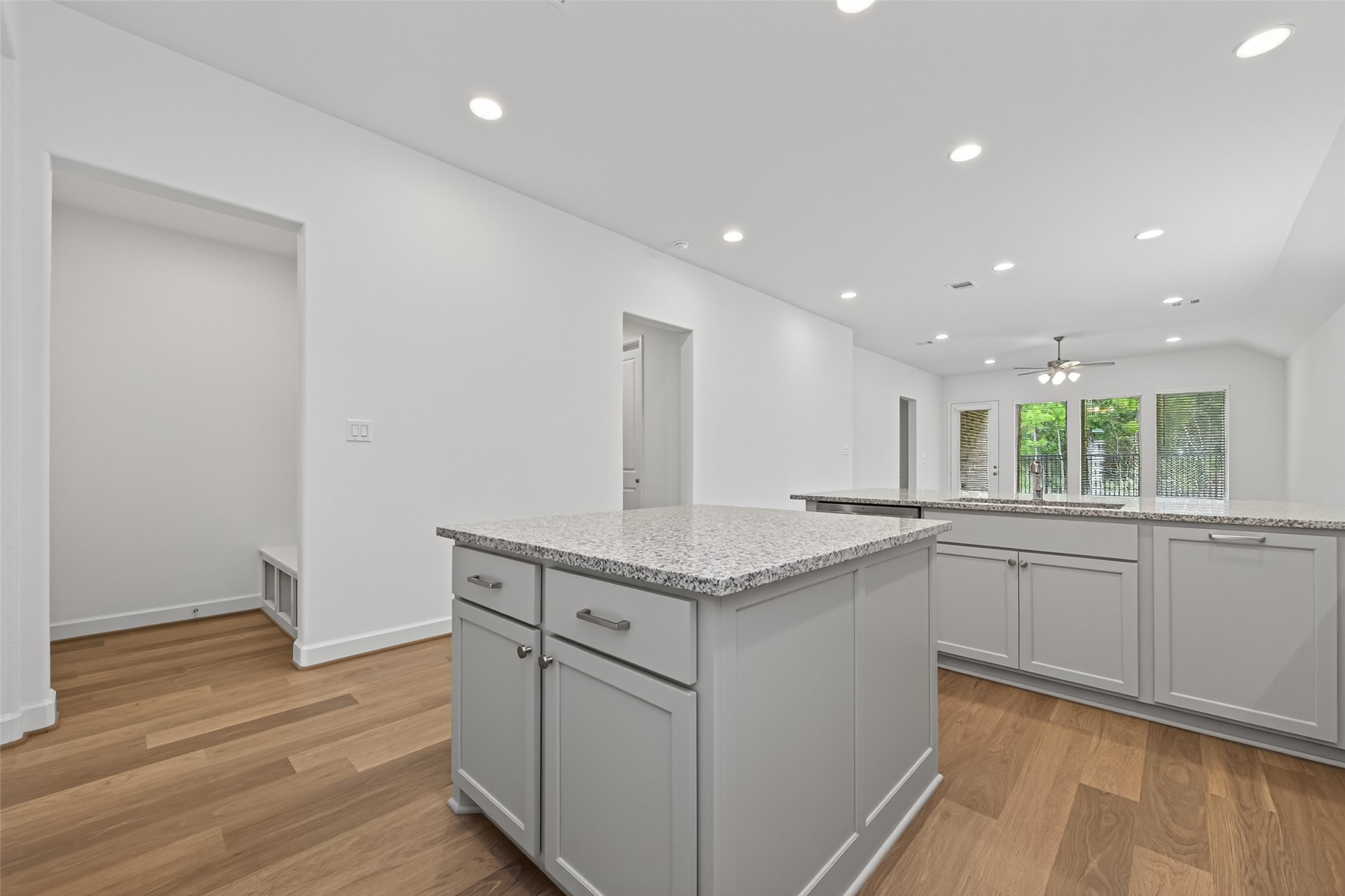 122 Sierra Strm Court Conroe, TX 77304 - Photo 12 of 40 a kitchen with stainless steel appliances granite countertop a sink and a stove top oven