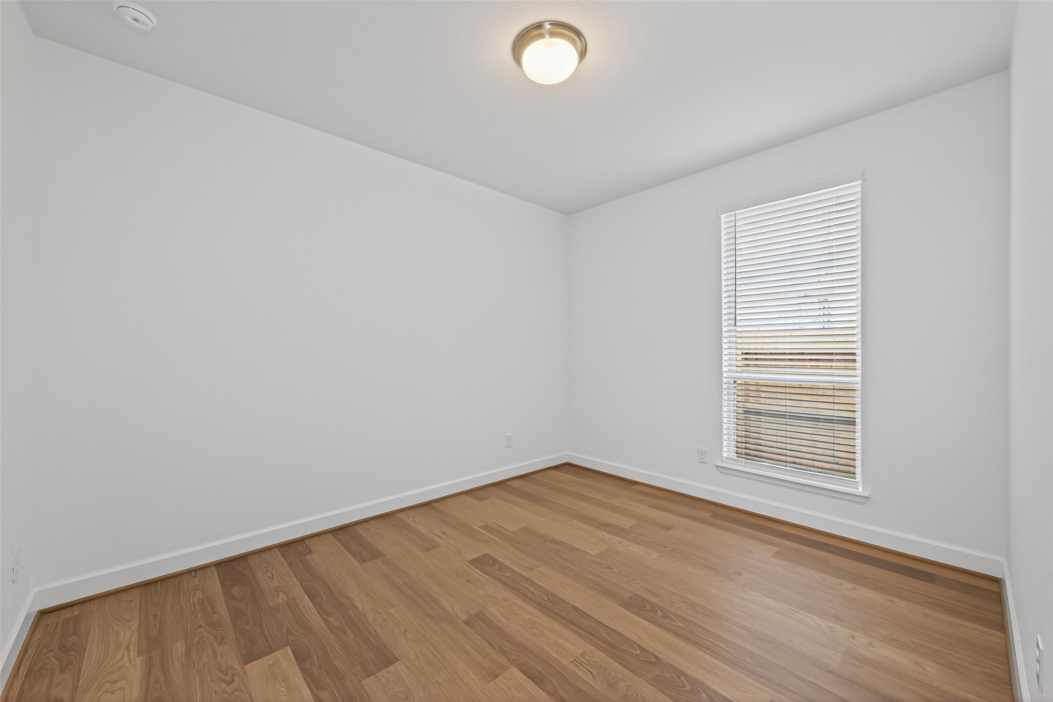 122 Sierra Strm Court Conroe, TX 77304 - Photo 24 of 40 an empty room with a window