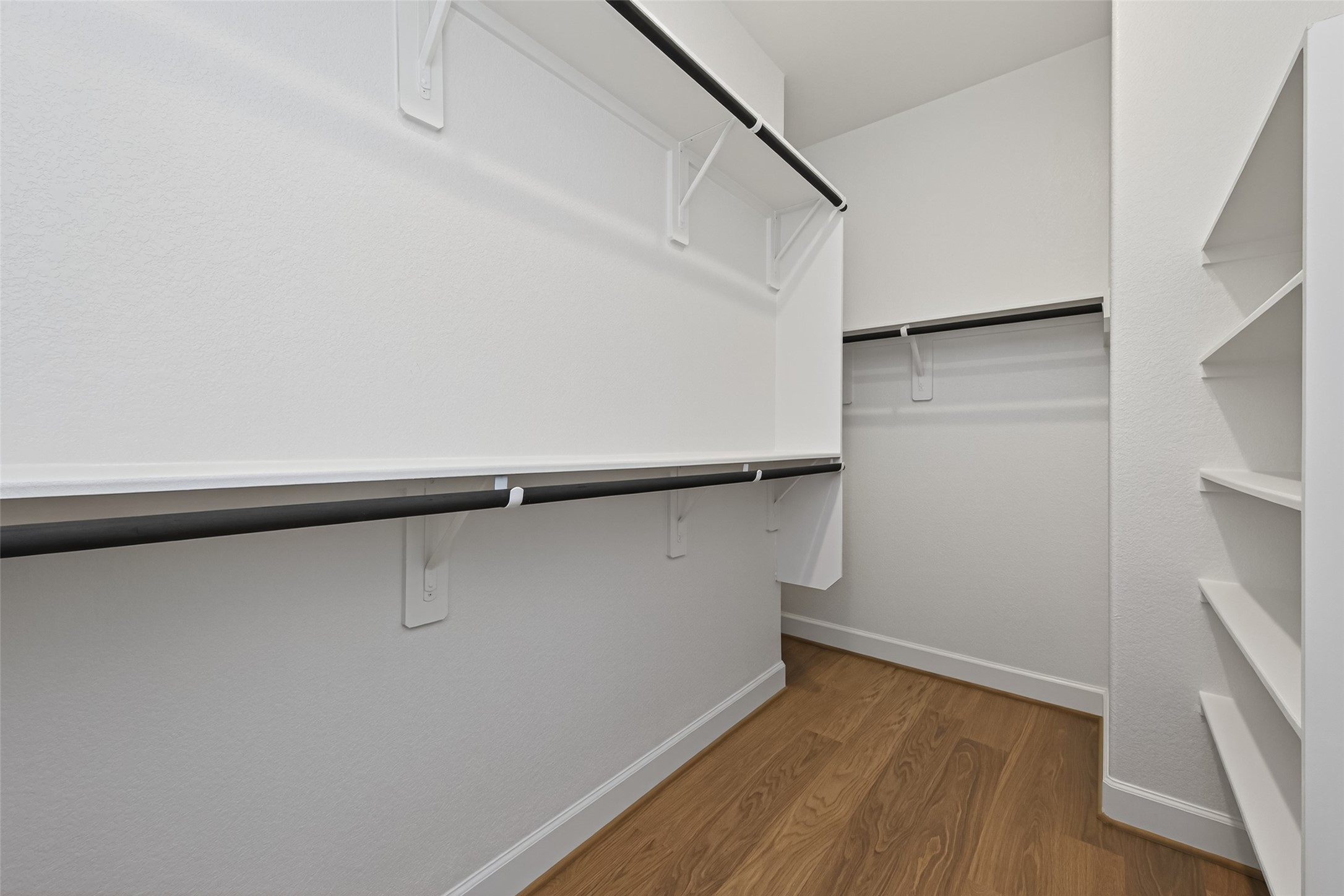 122 Sierra Strm Court Conroe, TX 77304 - Photo 33 of 40 a view of a room with wooden floor