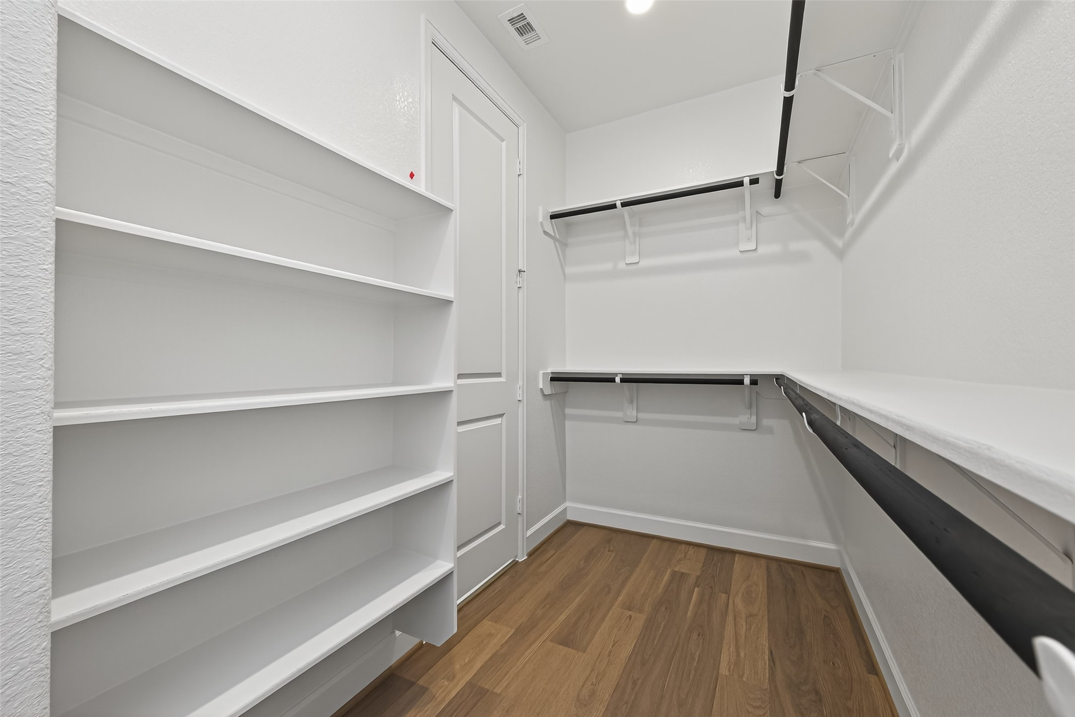 122 Sierra Strm Court Conroe, TX 77304 - Photo 34 of 40 a view of an empty walk in closet