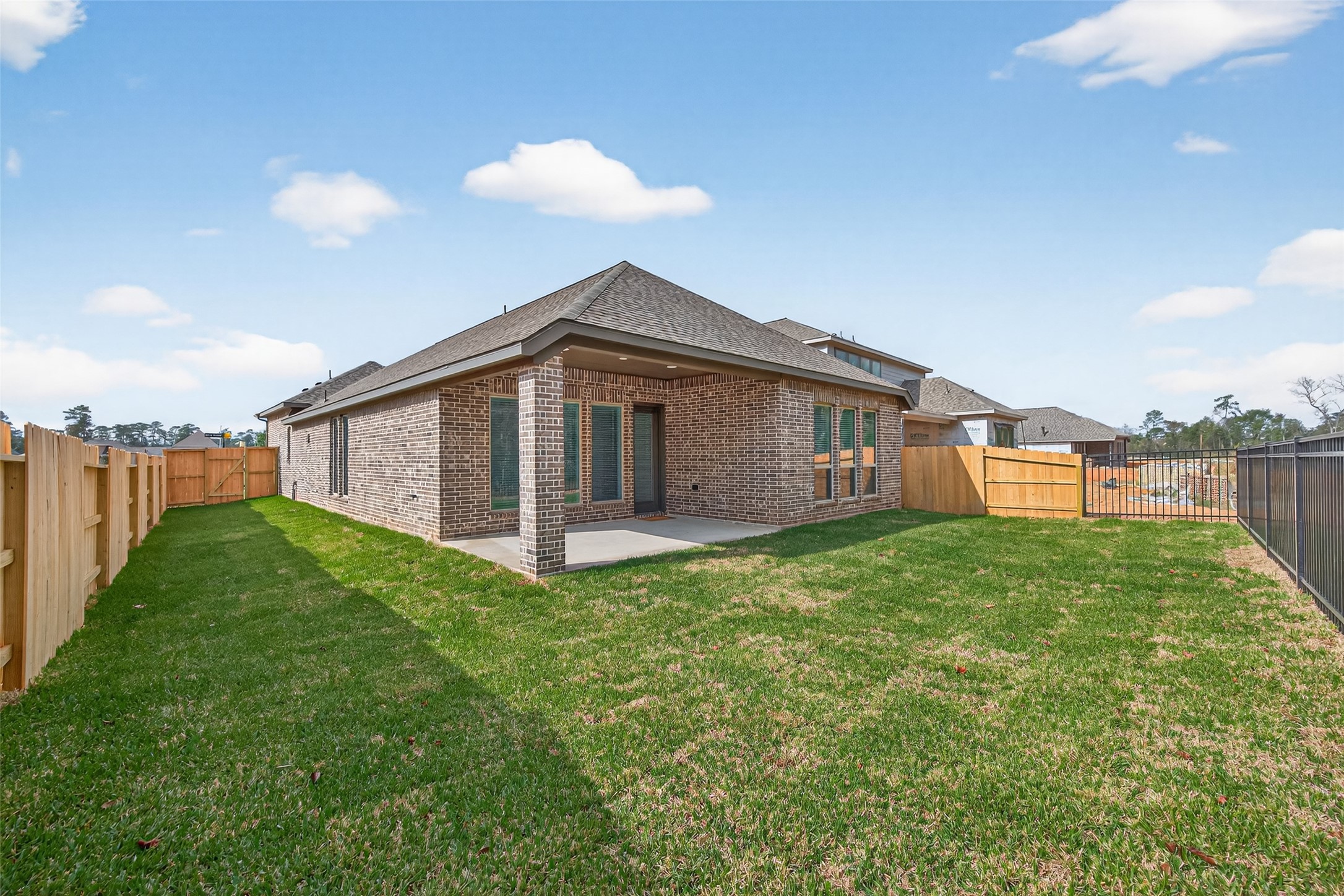 122 Sierra Strm Court Conroe, TX 77304 - Photo 35 of 40 a view of a house with backyard