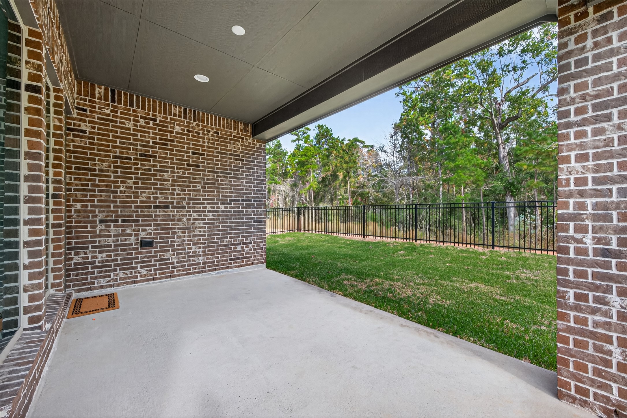 122 Sierra Strm Court Conroe, TX 77304 - Photo 37 of 40 a view of a pathway both side of building