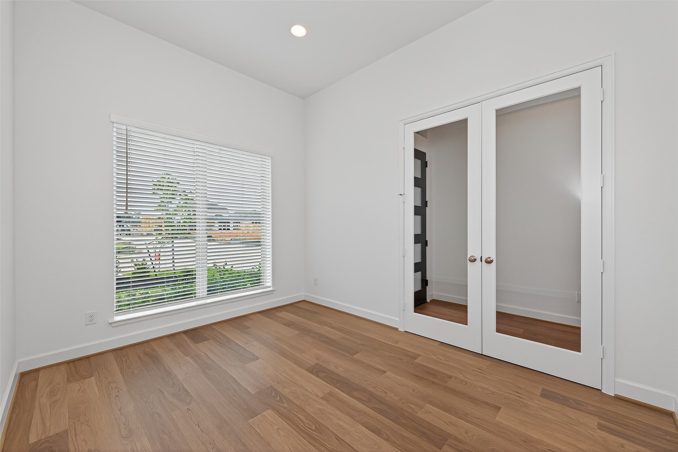 122 Sierra Strm Court Conroe, TX 77304 - Photo 6 of 40 a view of an empty room with glass door and a window