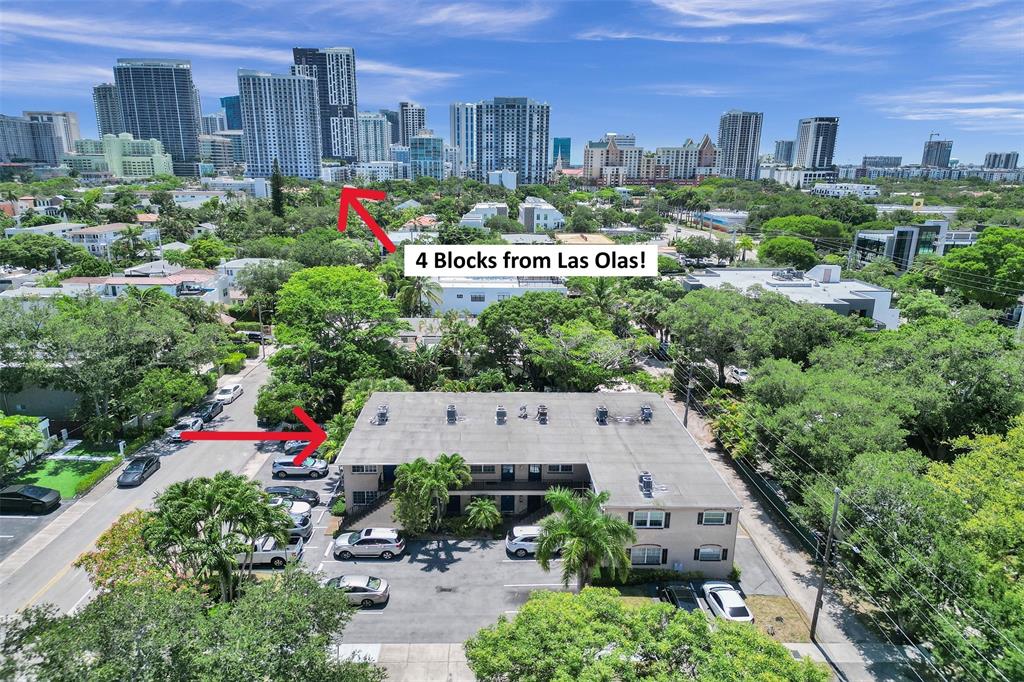 a view of a city with tall buildings