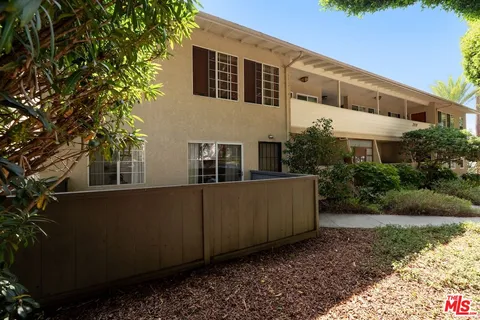 a house view with a outdoor space