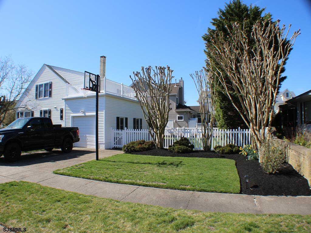 814 Wesley Road Ocean City, NJ 08226 - Photo 3 of 29 a house that has a tree in front of the house