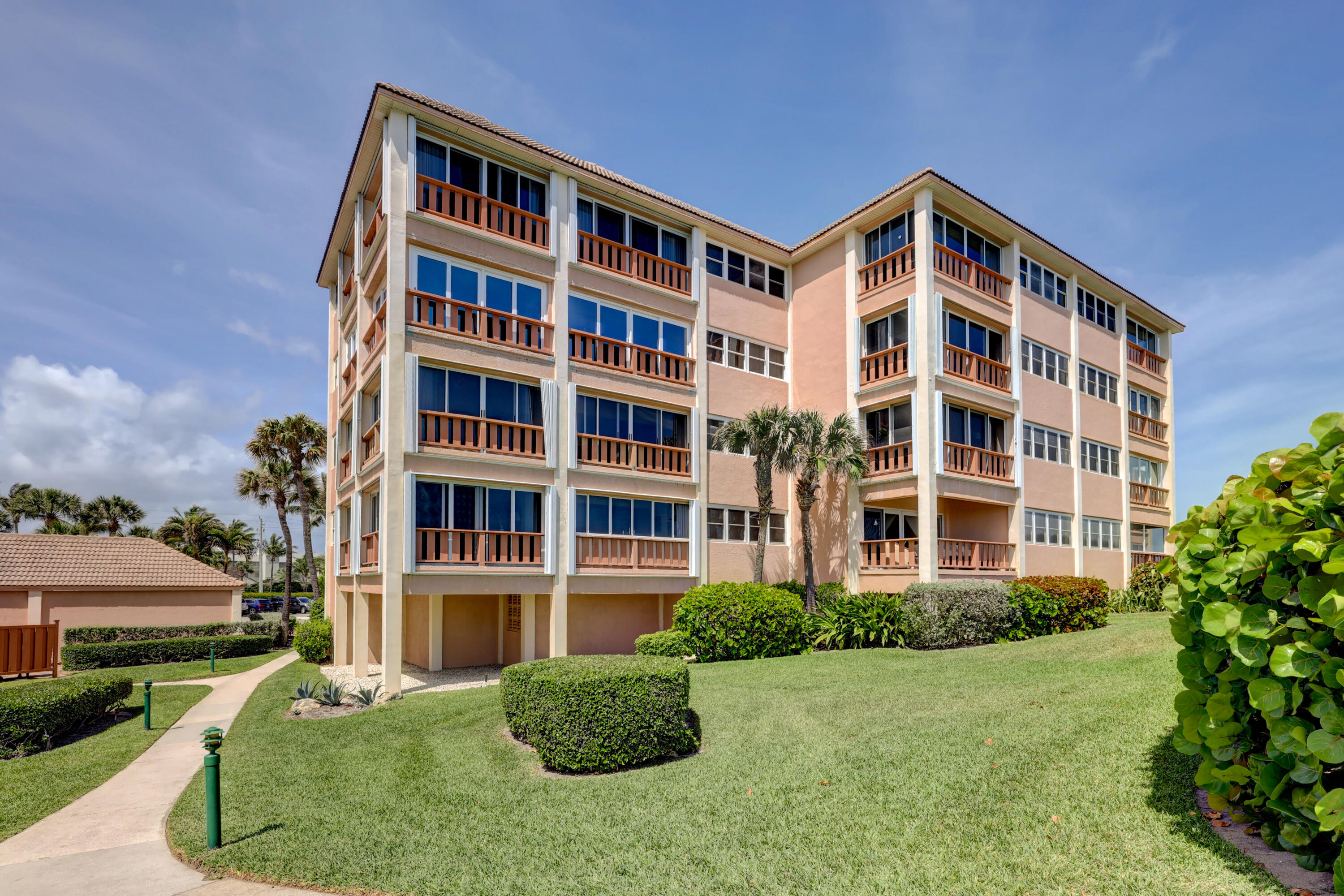 1555 Northeast Ocean Boulevard, Unit 205 Stuart, FL 34996 - Photo 11 of 57 a front view of a building