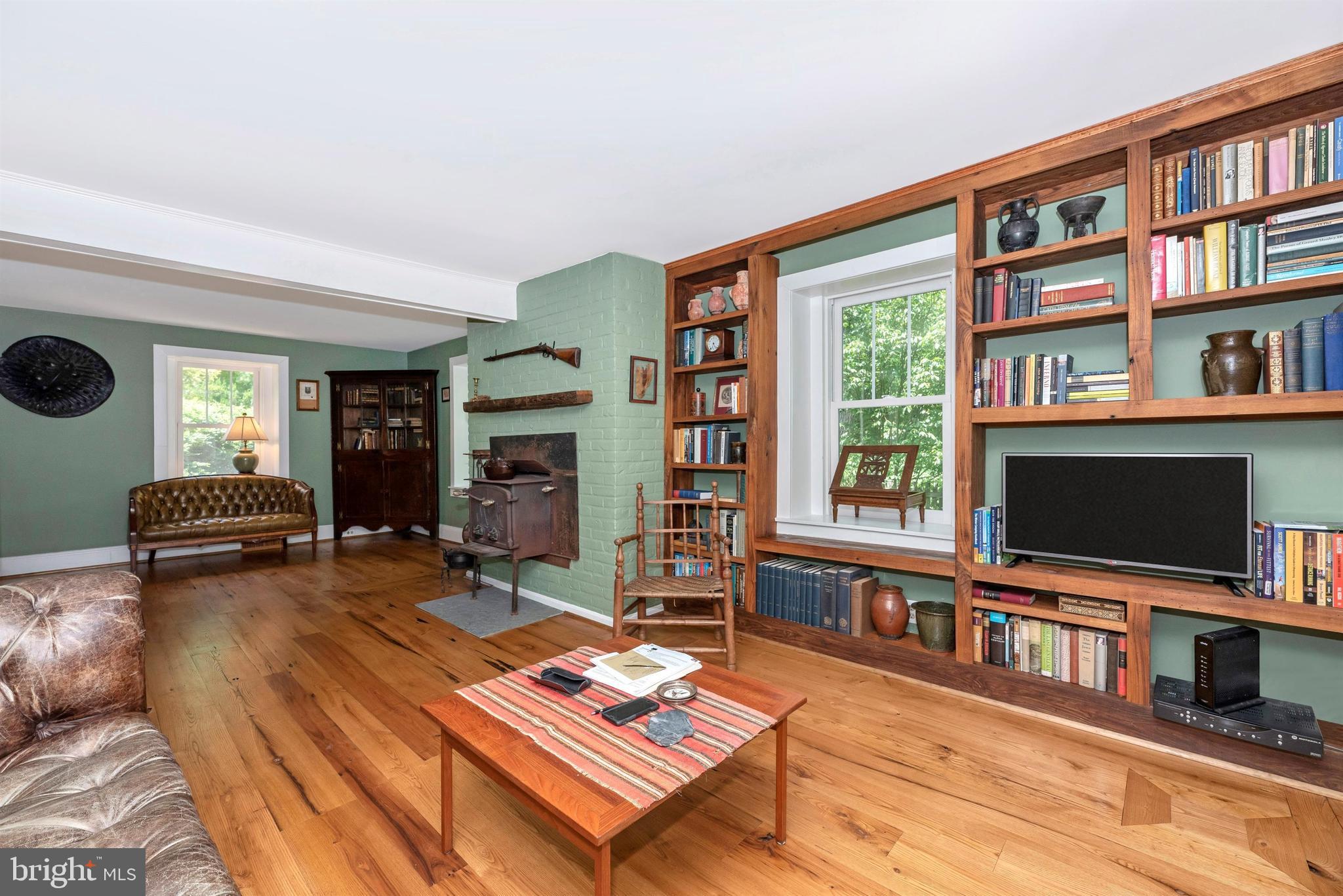 5309 Camp Raudy Road Frederick, MD 21702 - Photo 22 of 89 1st floor study has chestnut shelving &inlaid fls