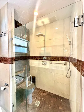 a view of a bathroom with a shower