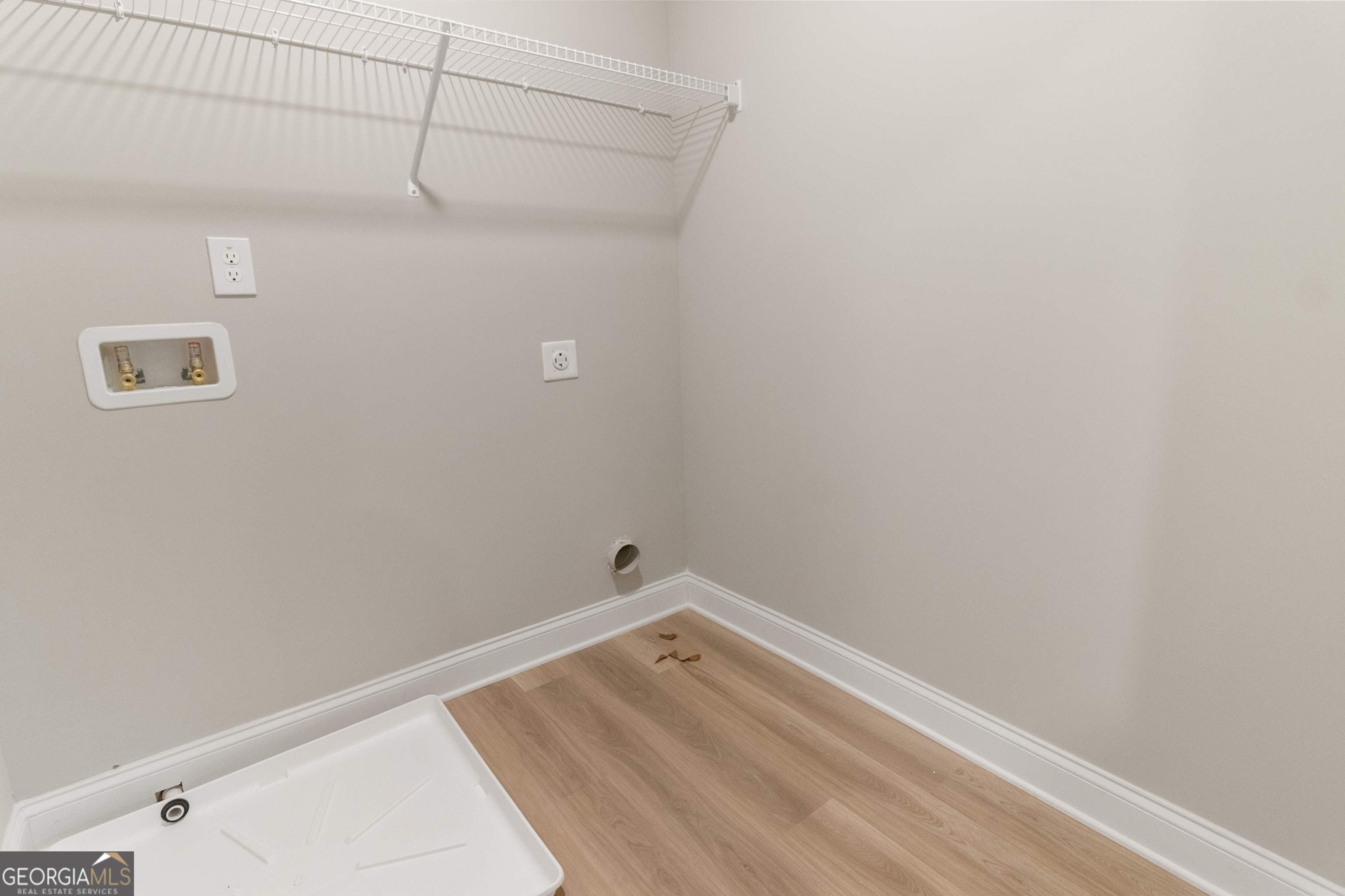 215 Davis Lake Road Thomaston, GA 30286 - Photo 15 of 29 a view of a room with empty racks