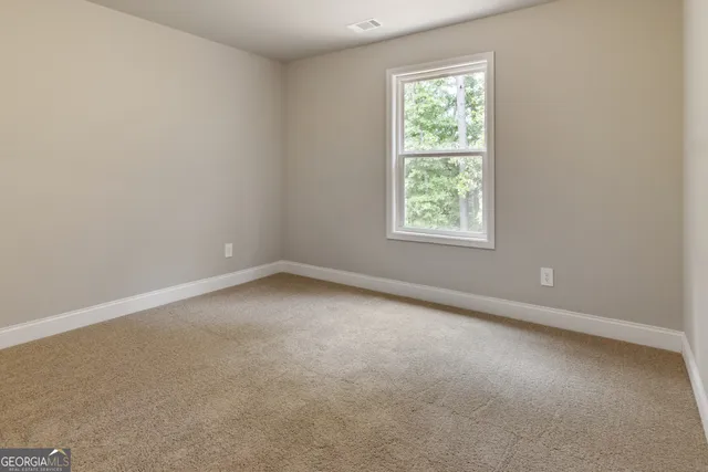 an empty room with a window