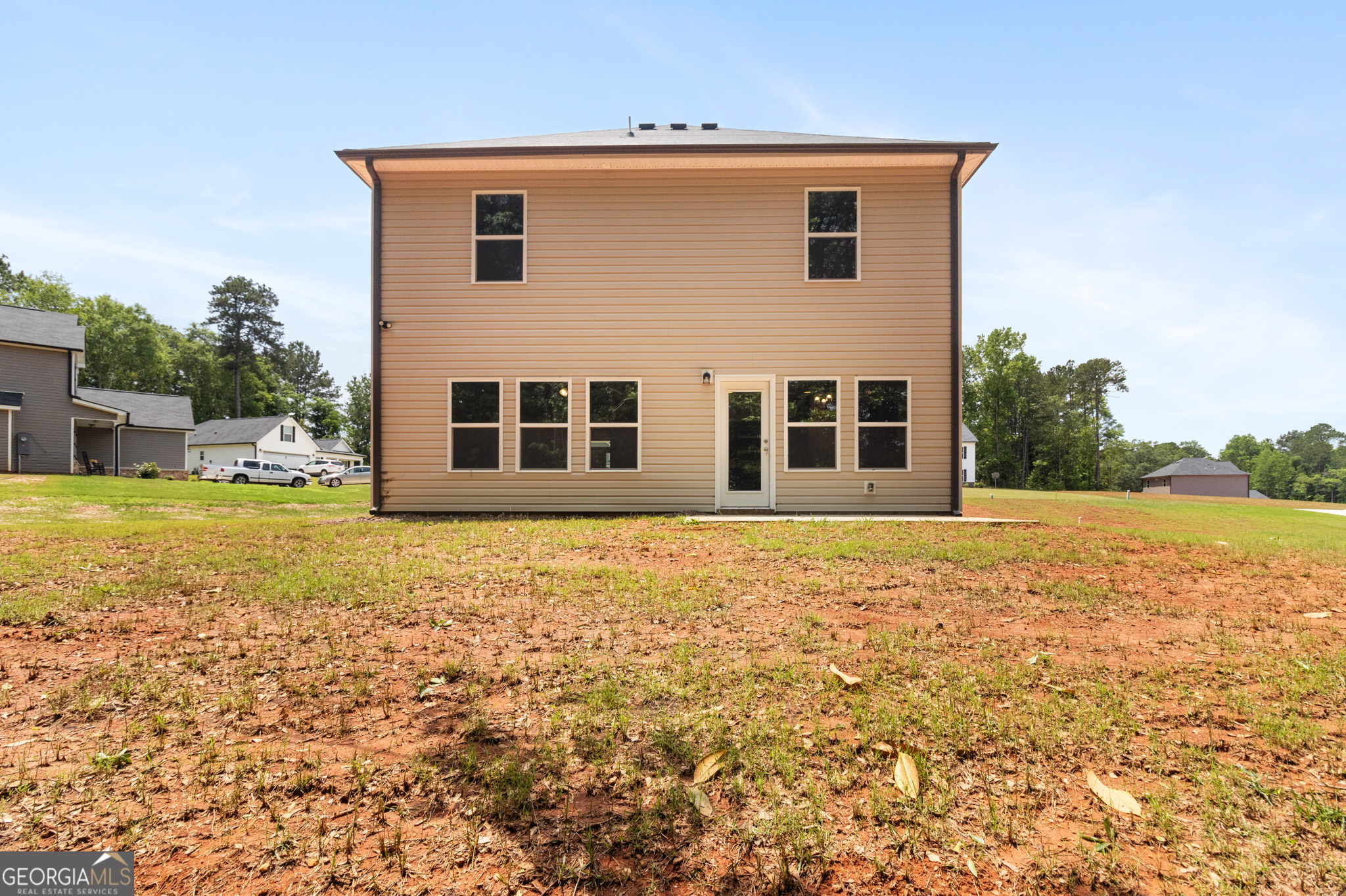 215 Davis Lake Road Thomaston, GA 30286 - Photo 27 of 29 a house view with swimming pool in front of it
