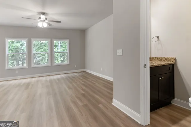 a view of an empty room with a window