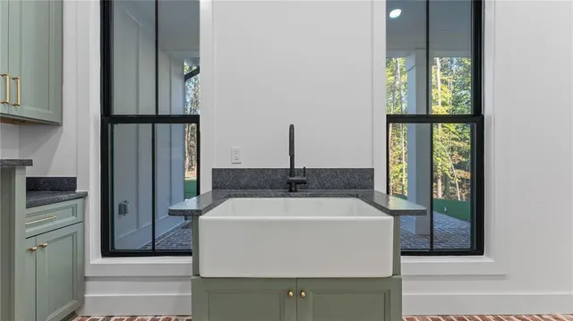 a room with water heater and a window