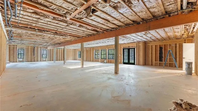 a view of an empty room with a projector