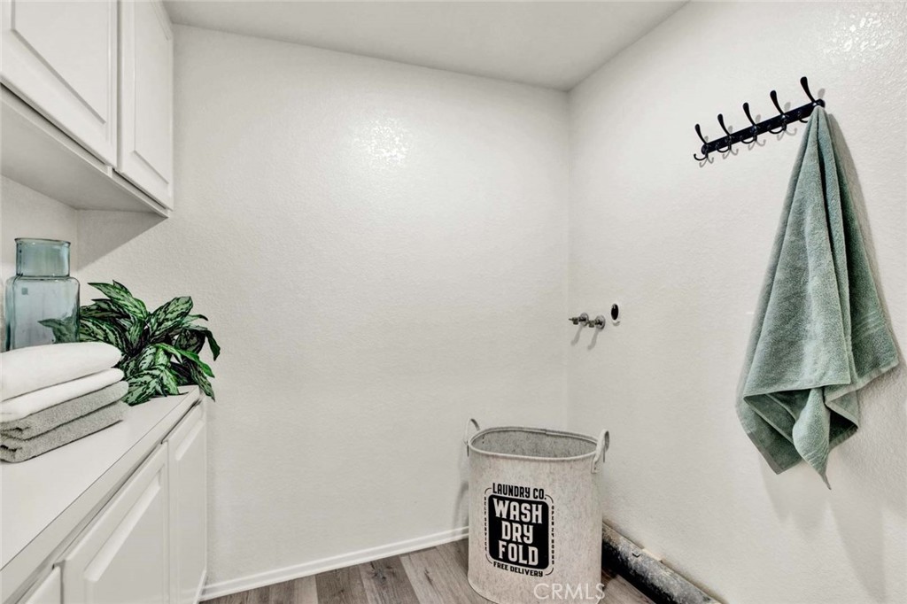 2569 Elden Avenue, Unit A1 Costa Mesa, CA 92627 - Photo 14 of 28 SEPARATE UPSTAIRS LAUNDRY ROOM