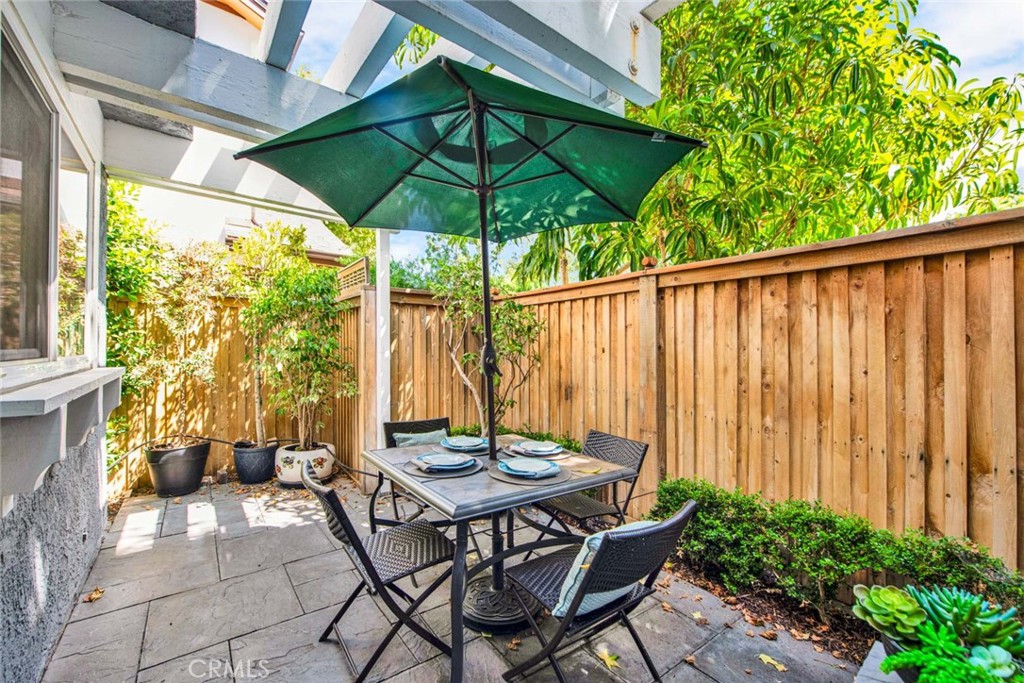 2569 Elden Avenue, Unit A1 Costa Mesa, CA 92627 - Photo 26 of 28 SIDE YARD, COURTYARD AREA FOR BBQ AND ENTERTAINING