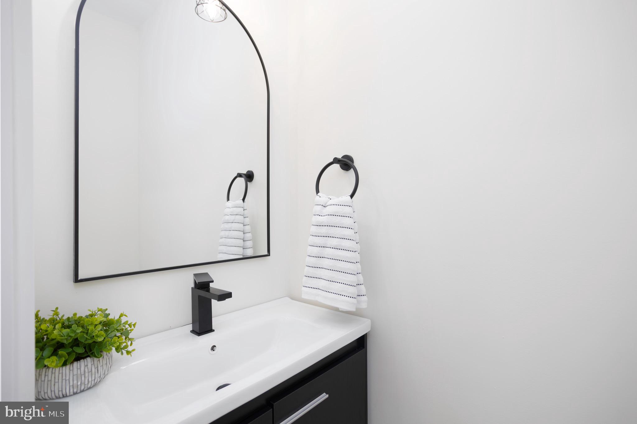 10 Sunrise Avenue Ridgely, MD 21660 - Photo 12 of 21 a bathroom with a sink and a mirror