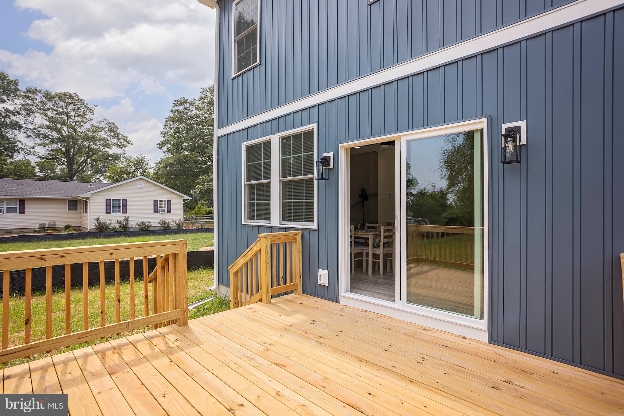 10 Sunrise Avenue Ridgely, MD 21660 - Photo 20 of 21 a view of a house with a balcony and wooden floor