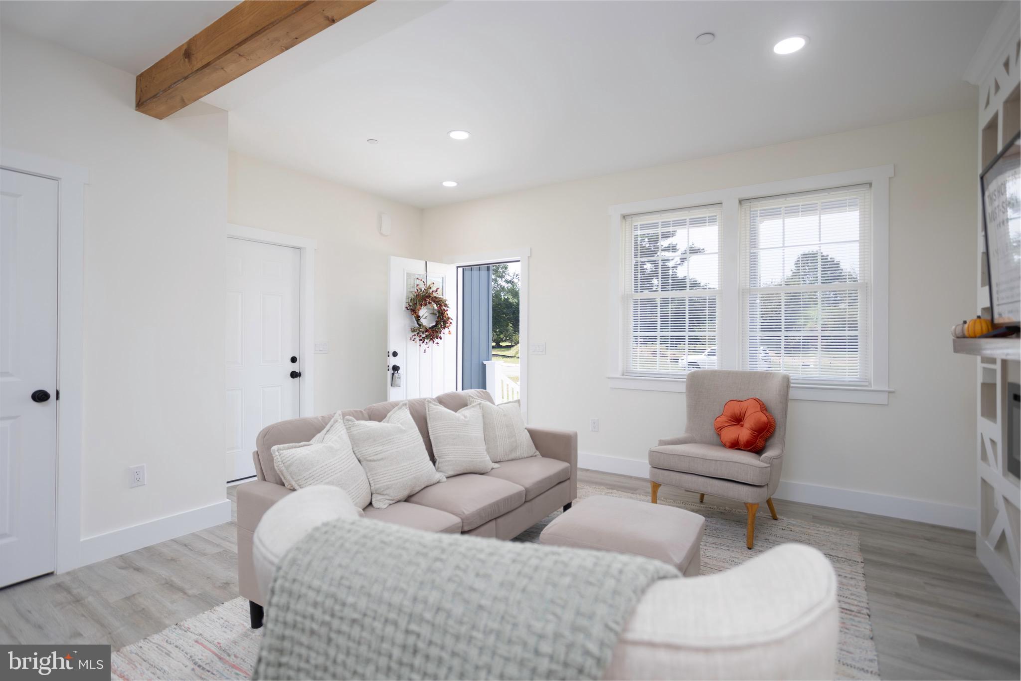 10 Sunrise Avenue Ridgely, MD 21660 - Photo 7 of 21 a living room with furniture and a window