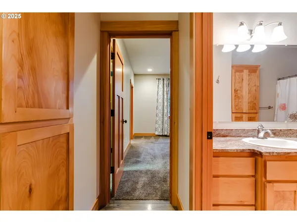 a bathroom with a sink double vanity and a mirror