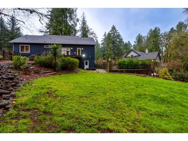 a view of backyard with green space