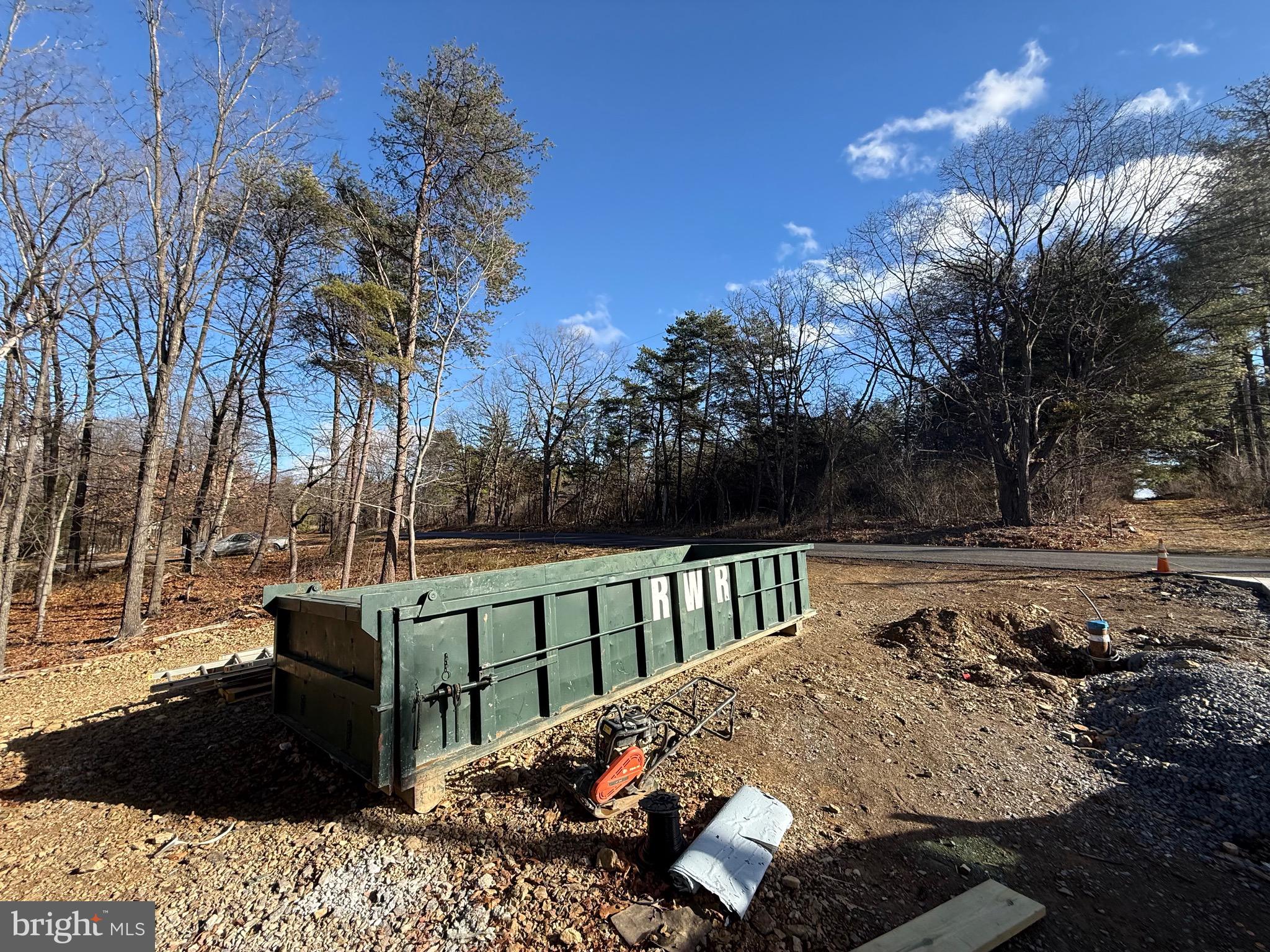 4352 Timber Ridge Road Berkeley Springs, WV 25411 - Photo 13 of 33 a view of a wooden deck and a backyard