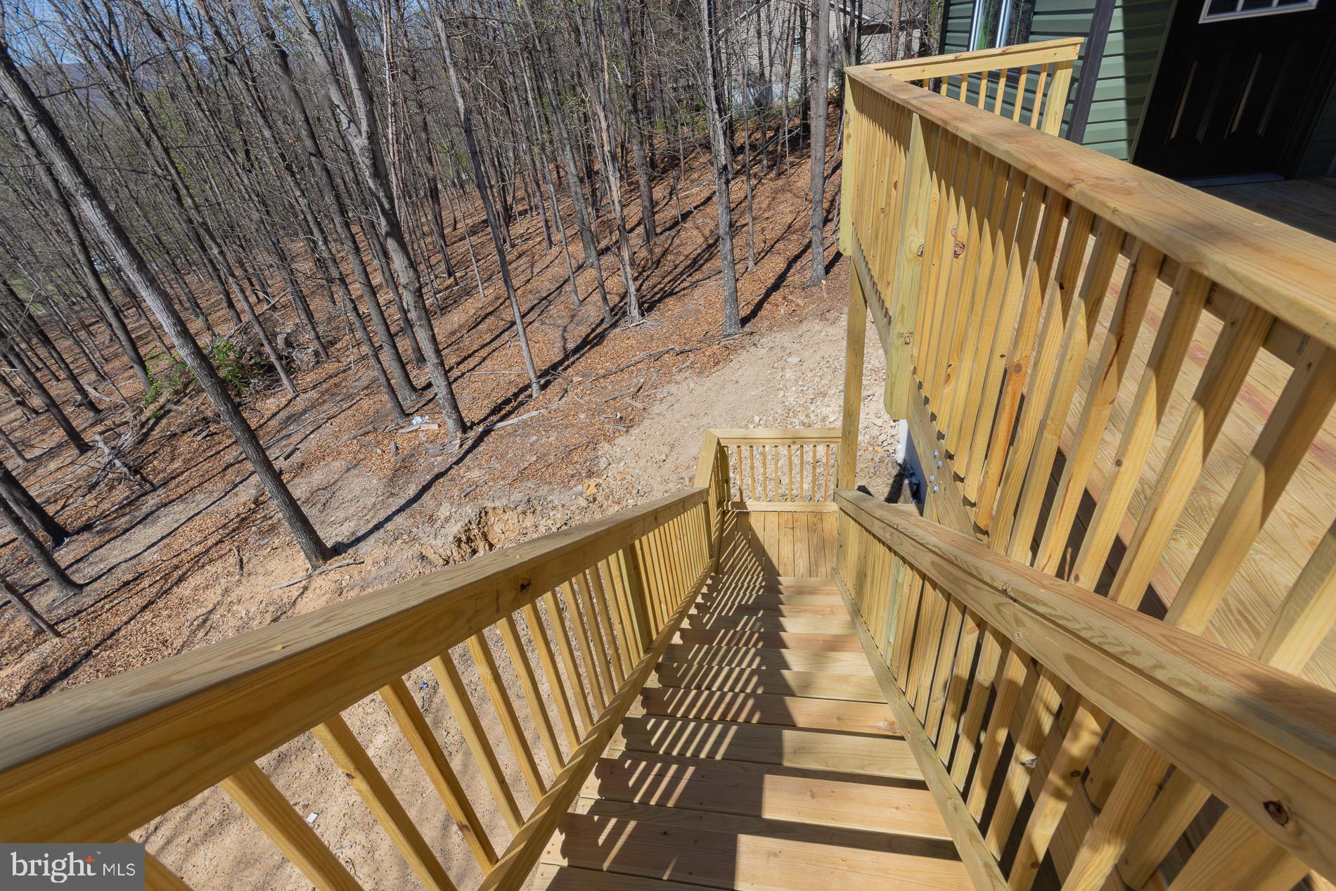 4352 Timber Ridge Road Berkeley Springs, WV 25411 - Photo 15 of 85 a view of balcony with wooden floor and fence