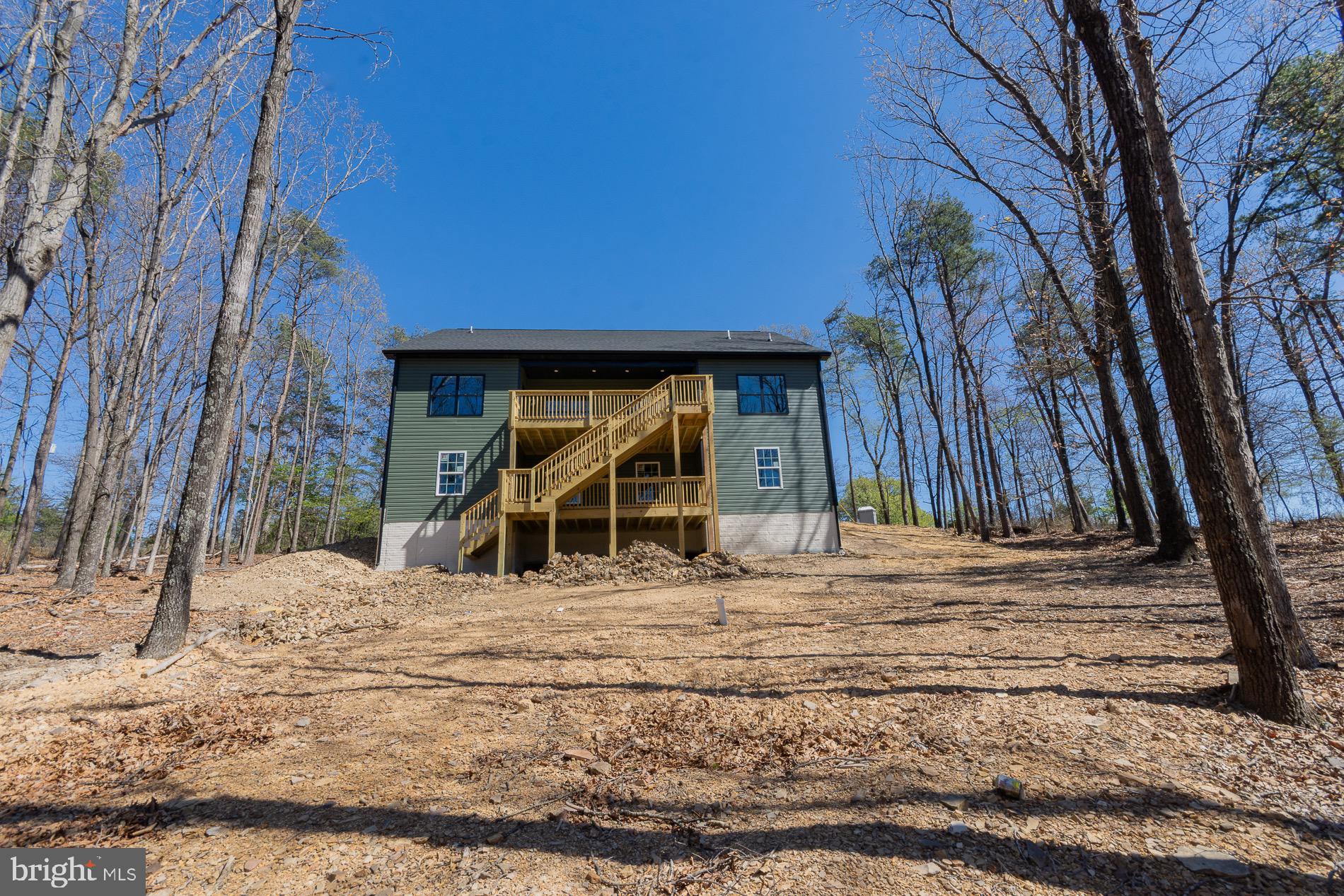 4352 Timber Ridge Road Berkeley Springs, WV 25411 - Photo 22 of 85 a view of a house with a snow