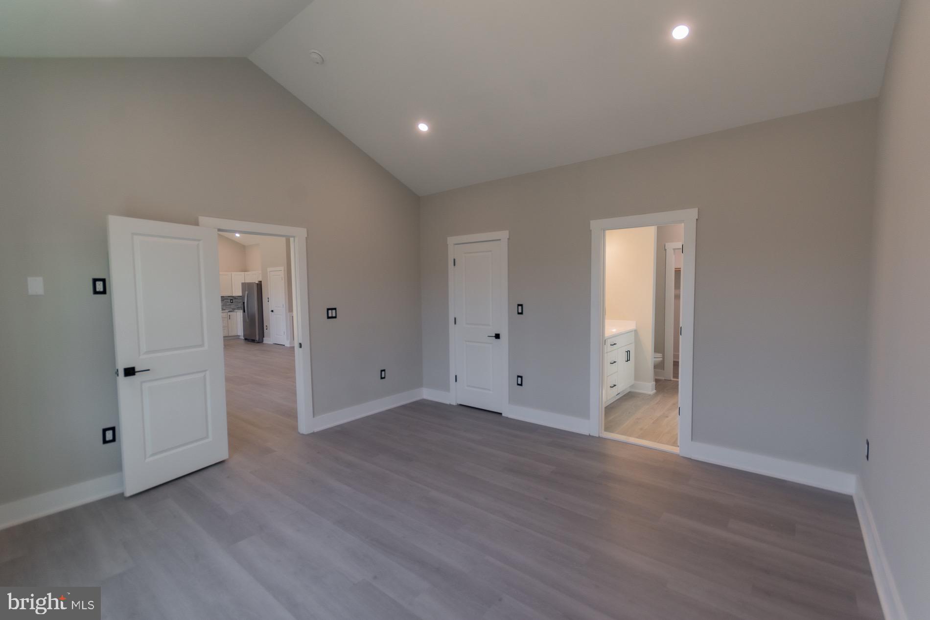 4352 Timber Ridge Road Berkeley Springs, WV 25411 - Photo 58 of 85 a view of an empty room with wooden floor and closet