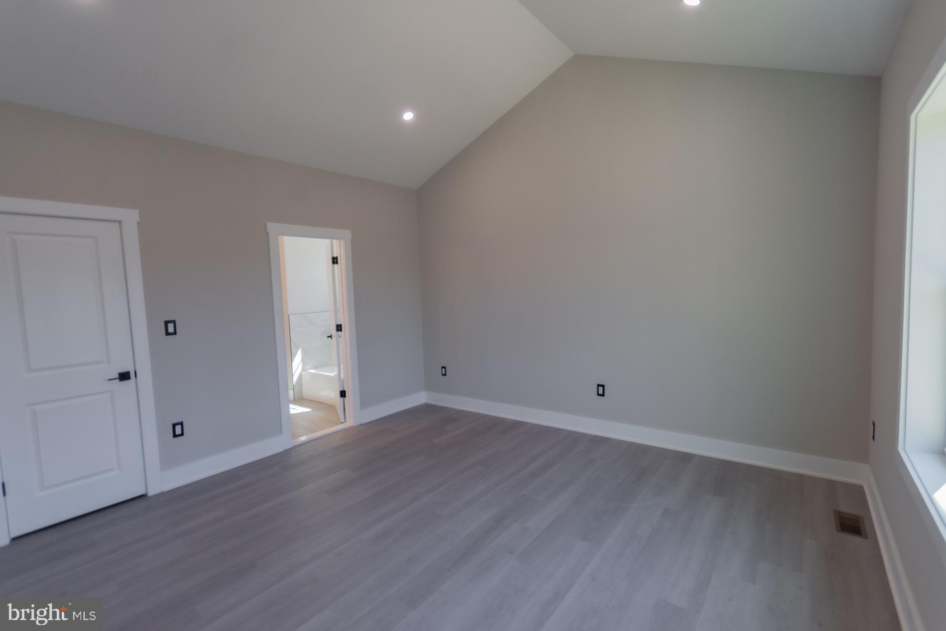 4352 Timber Ridge Road Berkeley Springs, WV 25411 - Photo 59 of 85 a view of an empty room with wooden floor