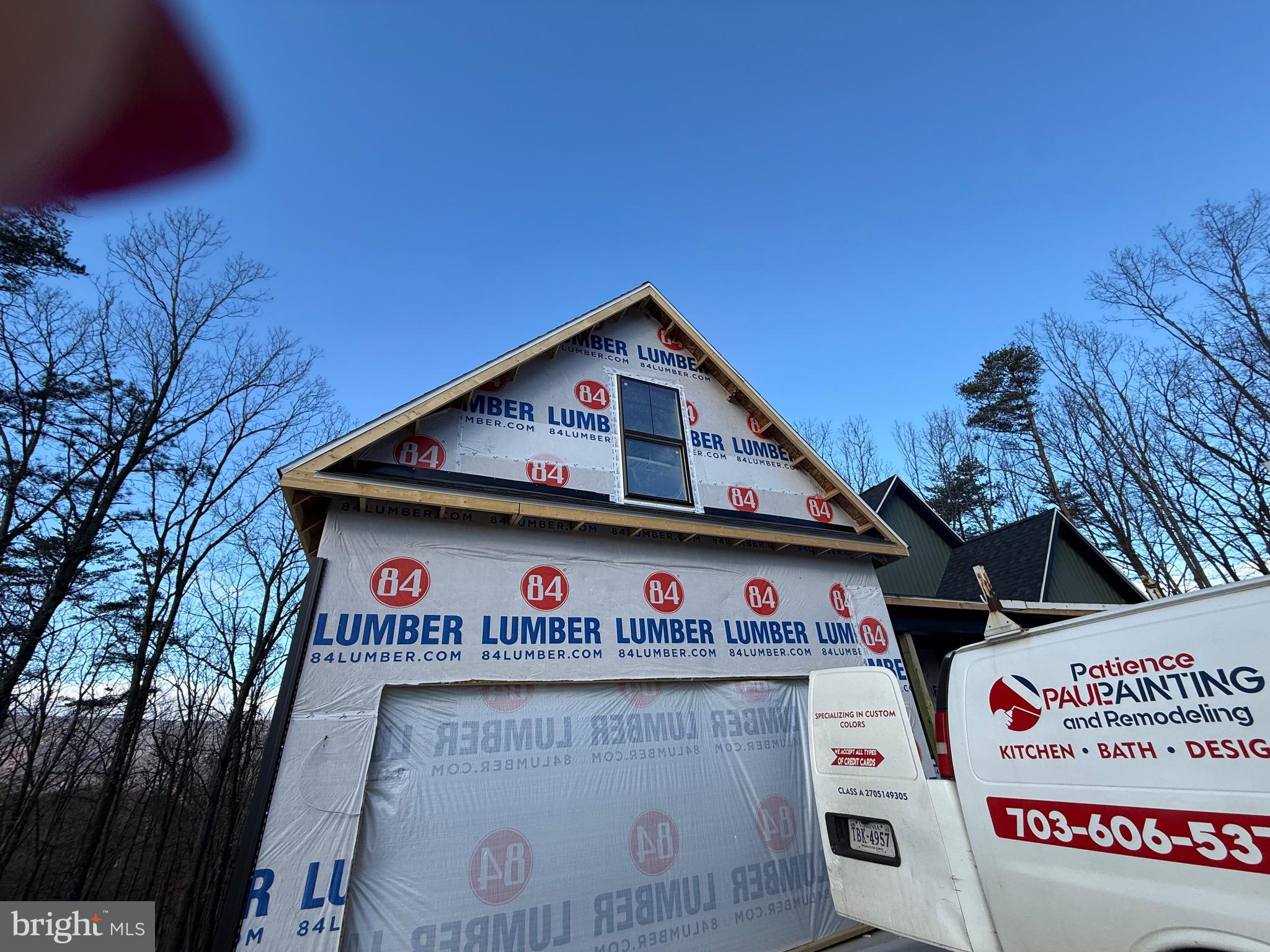 4352 Timber Ridge Road Berkeley Springs, WV 25411 - Photo 6 of 33 a front view of a house with lots of green space