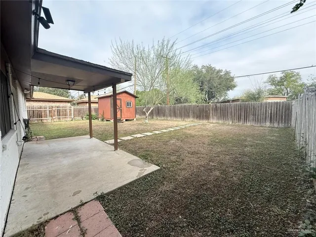 a view of a backyard of a house
