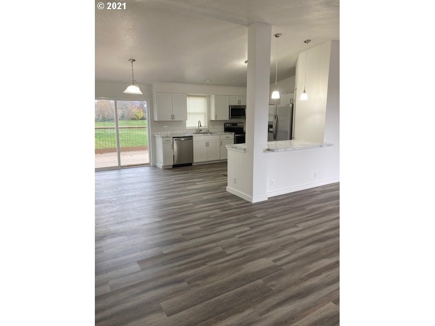 46368 Durham Place Pendleton, OR 97801 - Photo 4 of 32 a view of kitchen with furniture and wooden floor