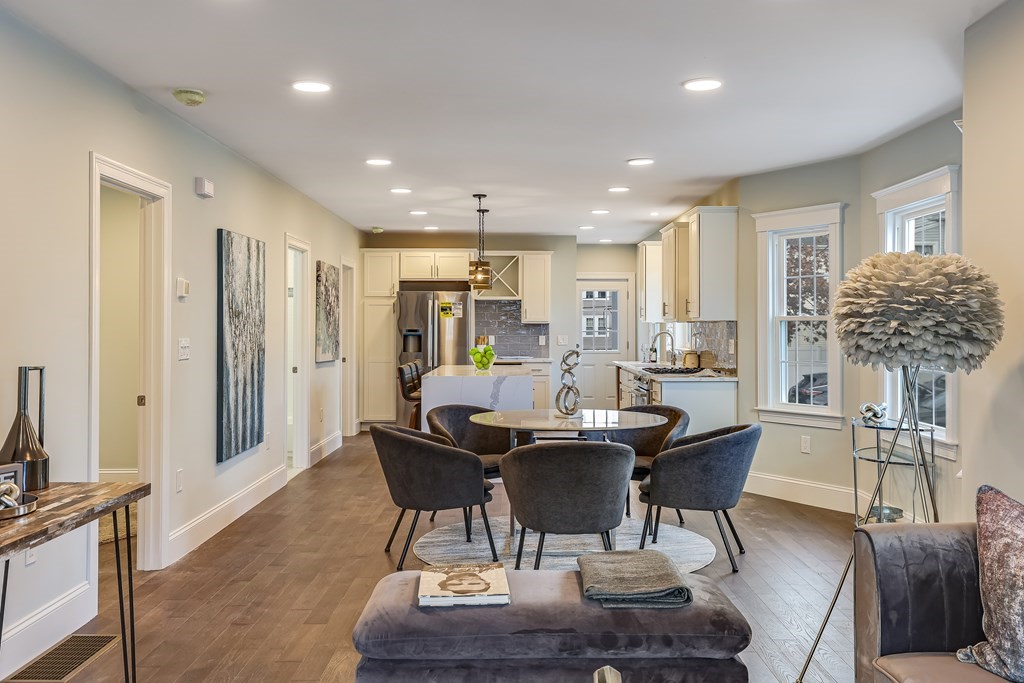 94 Marathon Street, Unit 1 Arlington, MA 02474 - Photo 2 of 24 a view of a dining room with furniture