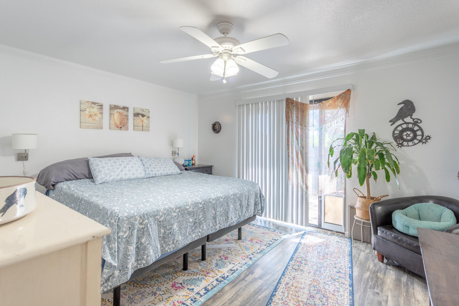 1274 Harpole Road Redding, CA 96002 - Photo 12 of 27 a bedroom with bed and a potted plant