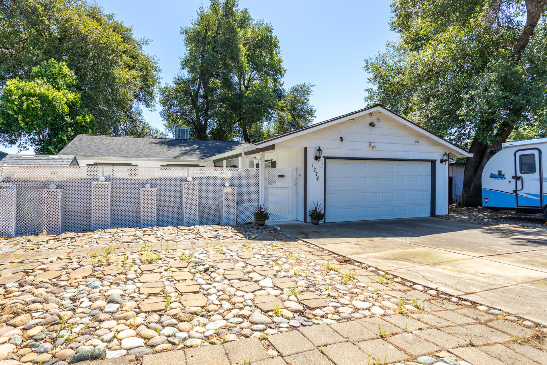 1274 Harpole Road Redding, CA 96002 - Photo 27 of 27 a view of a house with a yard