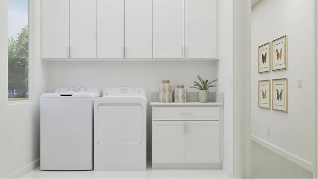 a utility room with dryer and washer