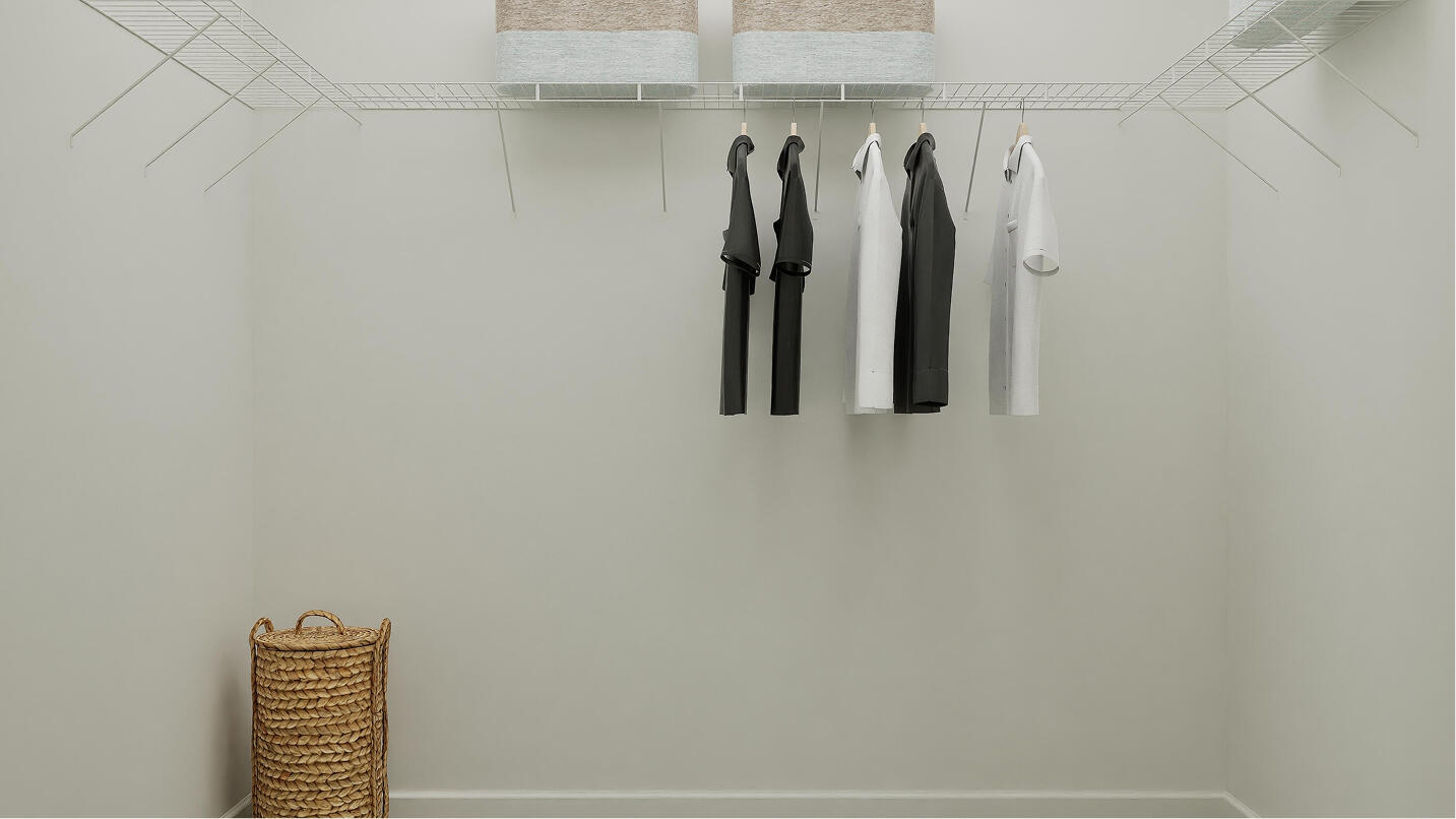 1022 Raleigh Way Wellington, FL 33449 - Photo 9 of 16 a view of walk in closet with clothes