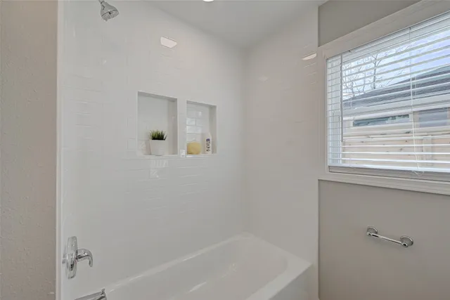 a bathroom with a bathtub