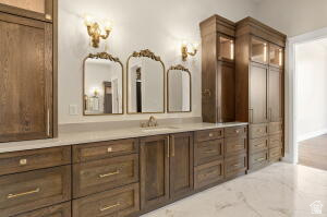 1141 East Lost Ridge Drive Washington, UT 84780 - Photo 62 of 108 Extensive built-in cabinetry with wood-finish doors and brass hardware