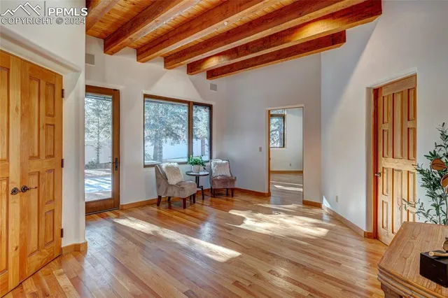 a view of a livingroom with furniture and window