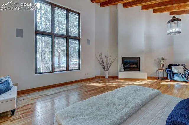 a view of a livingroom with furniture and window